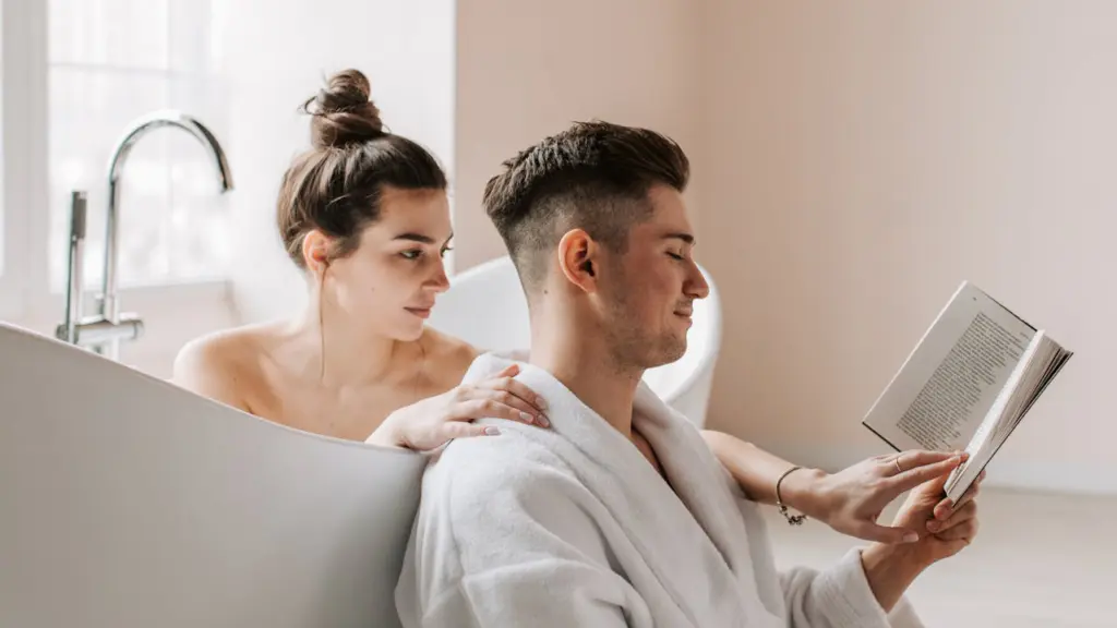 Couple reading romantic comedy novels