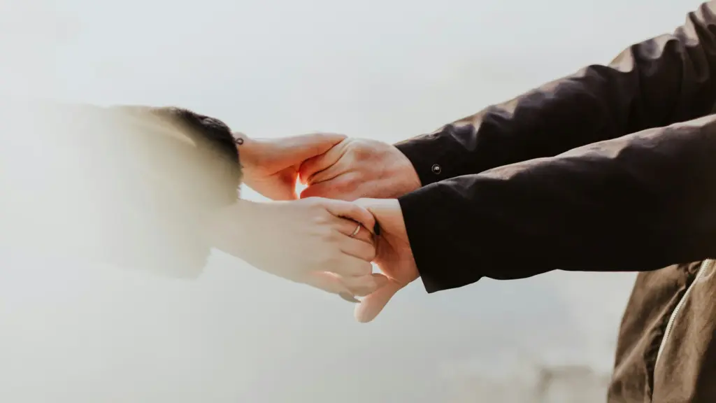 Happy couple holding hands